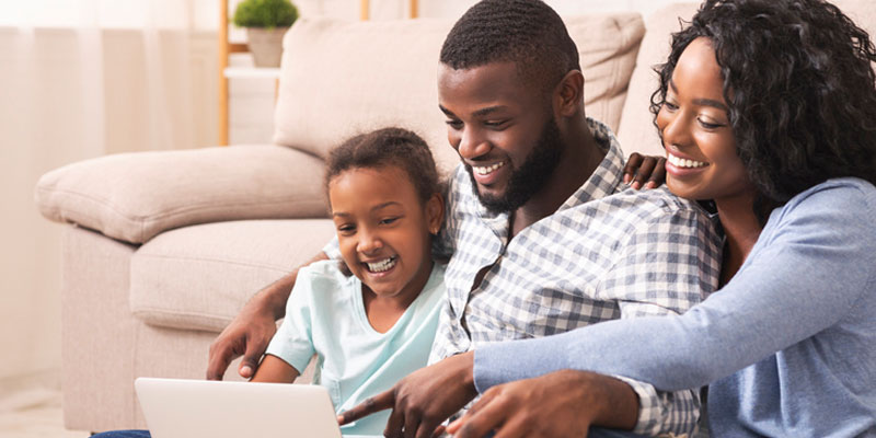 Family looking at computer