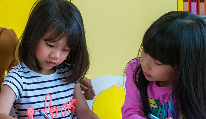 two girls playing