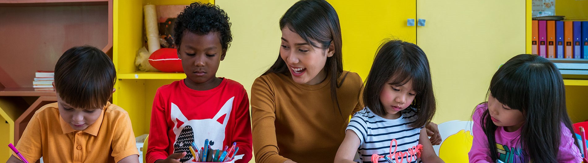 An Early Childhood Educator plays with children