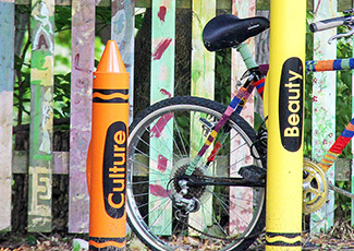 standing art crayons with bicycle
