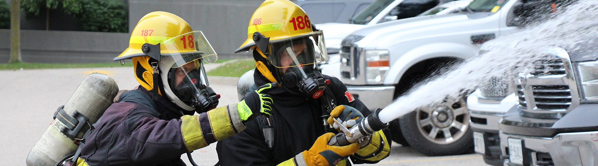 Firefighters spraying water