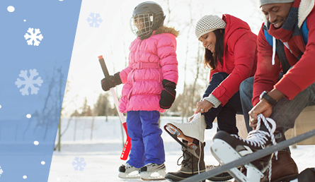 Lacing ice-skates by rink