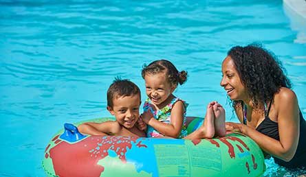 Family in the lazy river pool