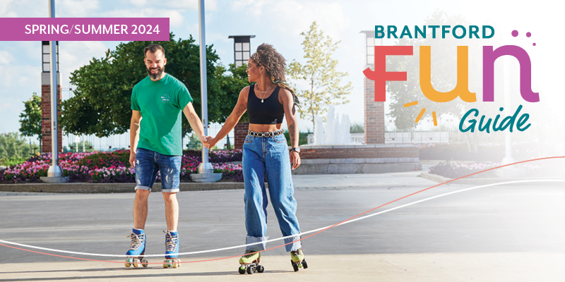 Couple holding hands and rollerskating 