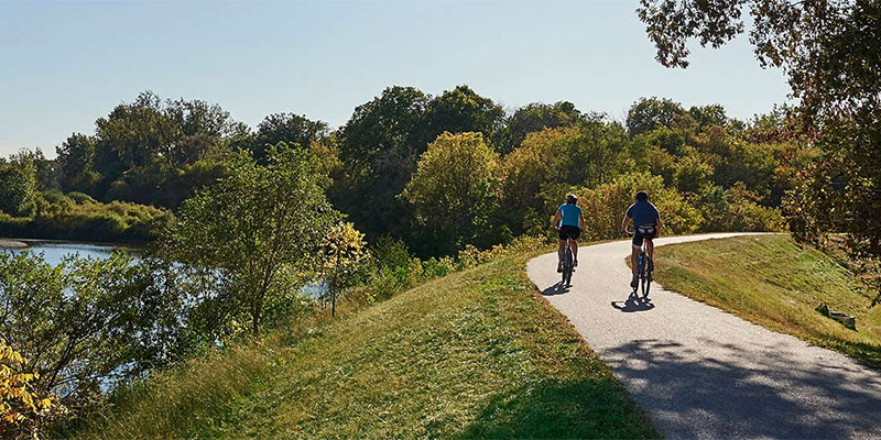 Couple biking down the trail in Brantford