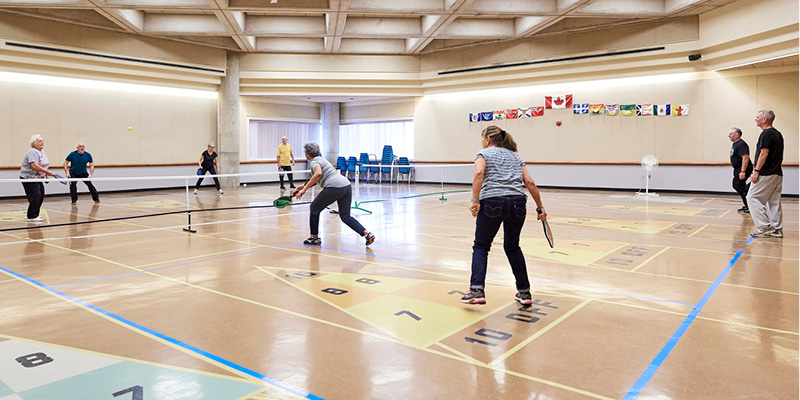 Seniors playing pickleball