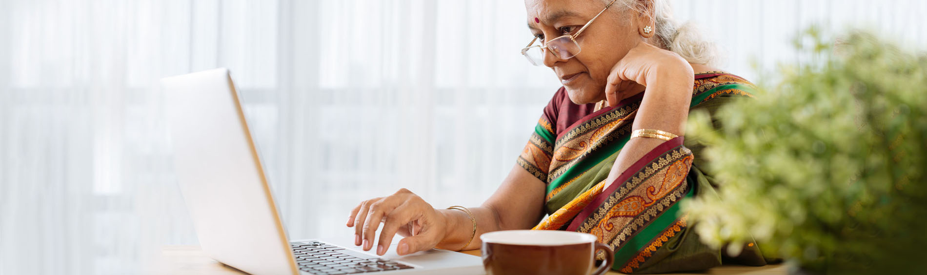 Senior on computer