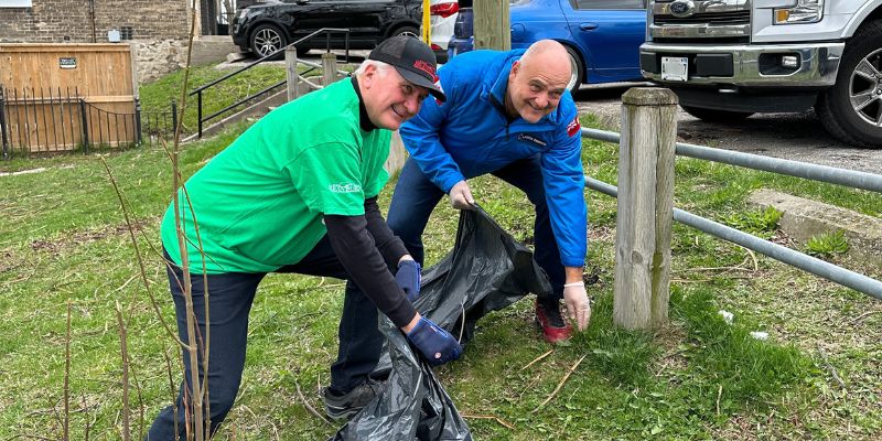 Mayor Kevin Davis and MP Larry Brock participating in Let's Clean Our City community clean-up event