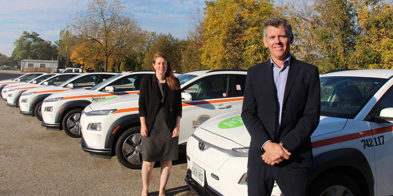 City of Brantford staff standing with new electric vehicle fleet