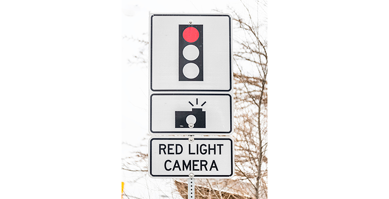 Red light camera traffic sign