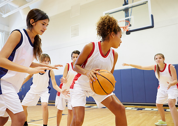 Girls playing basketball