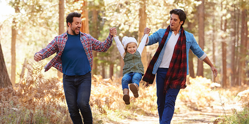 Family hiking on trail