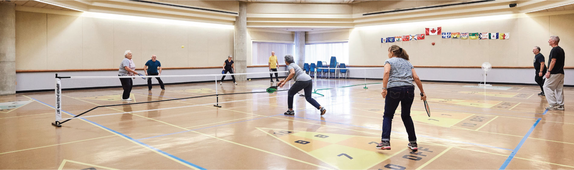 Pickleball in gymnasium