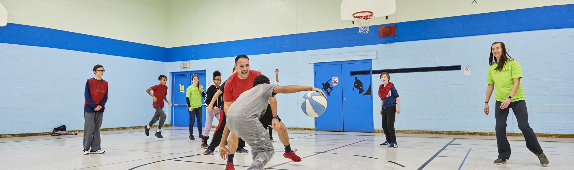 Kids playing sports in gymnasium