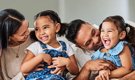 Family laughing with each other