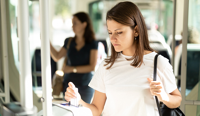 Rider paying bus driver