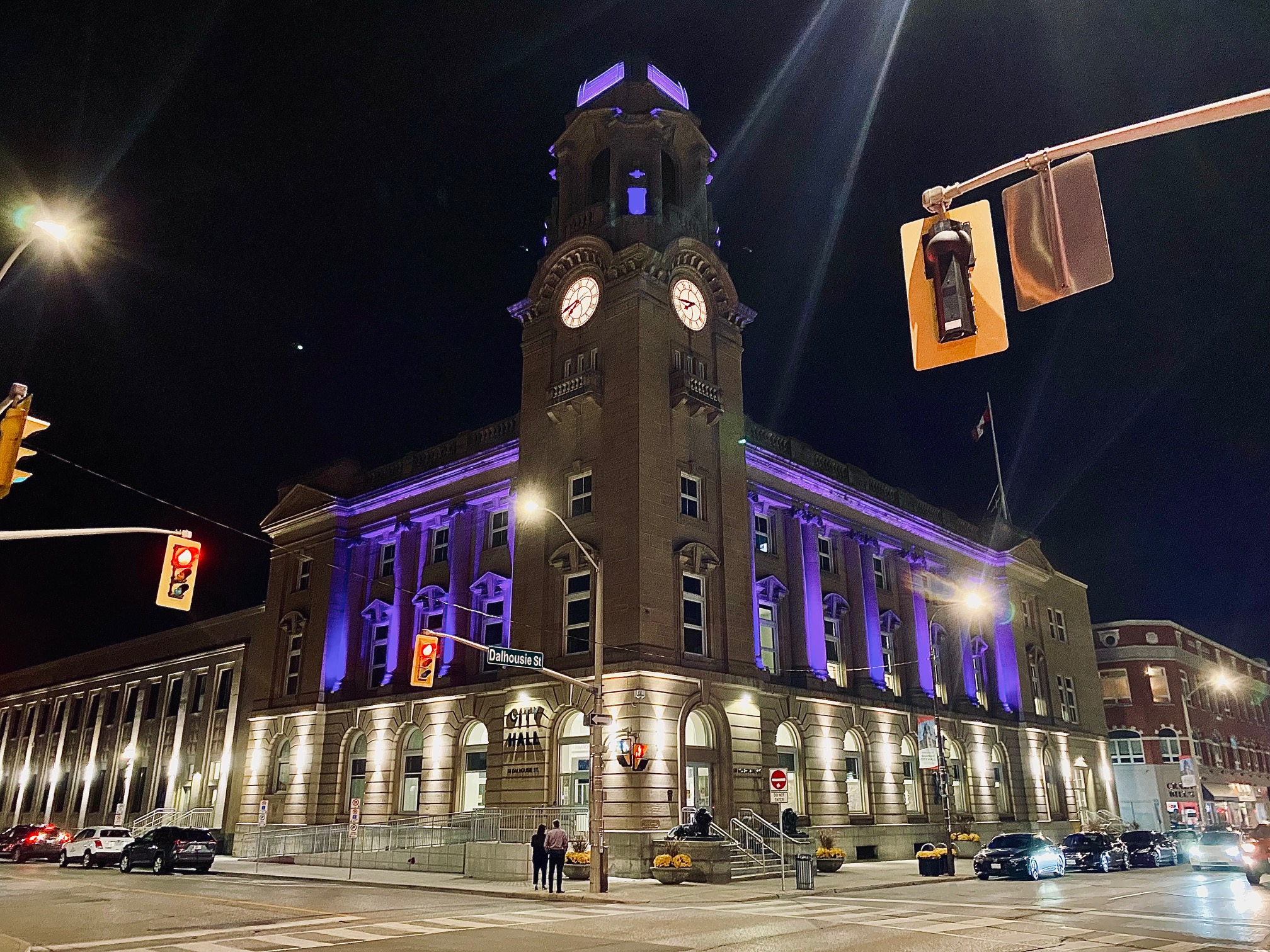 City Hall lit in purple and blue