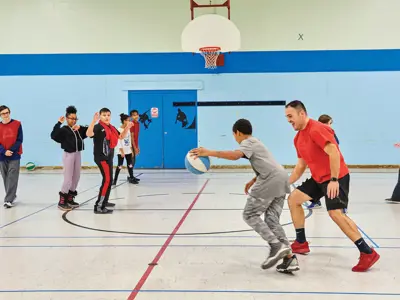 Kids playing in a gymnasium