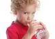 young boy drinking water