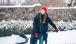 Volunteer shovelling snow