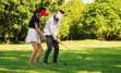 golf instructor with student