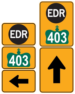 Yellow-and-black EDR trailblazer signs used to guide drivers along the detour route back to Highway 403