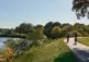 people on trail by grand river