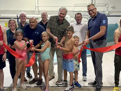 Slide_ribbon_cutting-800x400.jpeg