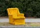 old chair sitting by curb