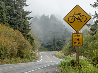 Share the road sign