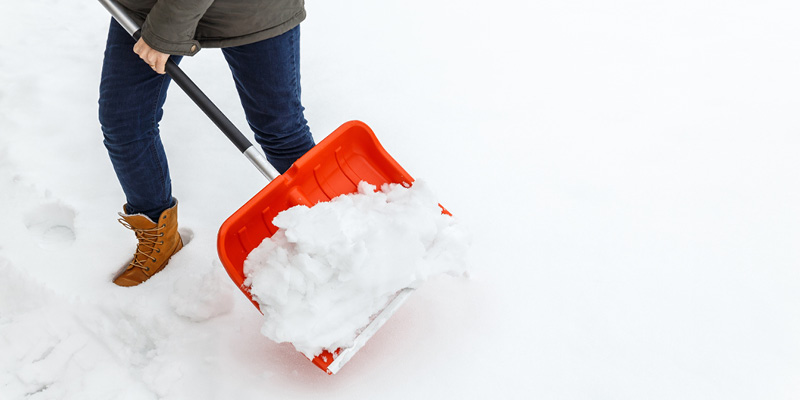 Image of person shovelling snow.