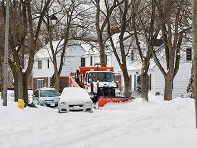 Snowplow clearing a street